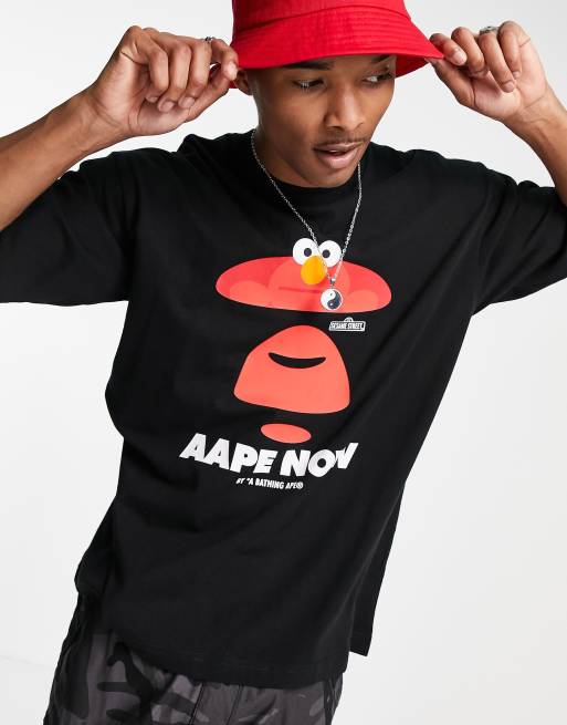 Camiseta negra con cara de simio de AAPE By A Bathing Ape x Sesame Street