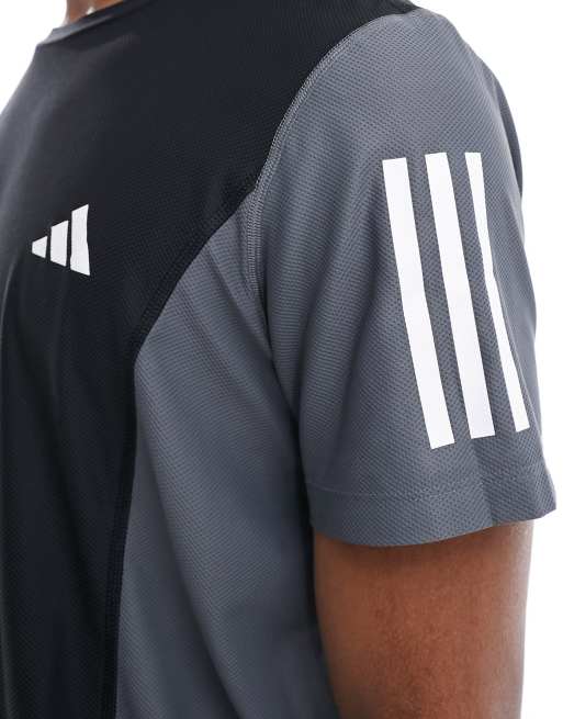 Camiseta negra con dise o color block Own The Run de adidas performance