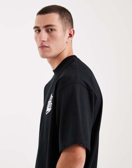 Camiseta negra con estampado gráfico en la espalda Solo Swoosh de Nike, 4 de 5