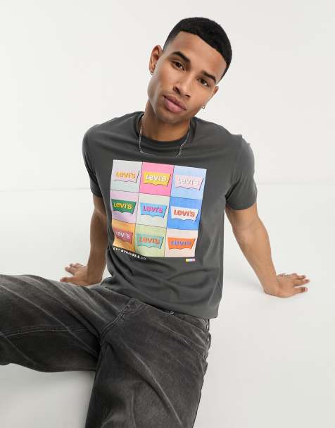 Camiseta negra con estampado posicional de logo en tonos neón exclusiva en ASOS de Levi's - view 1