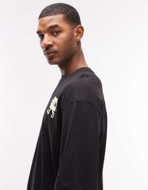 Camiseta negra con estampado trasero Explore de The North Face, 4 de 5