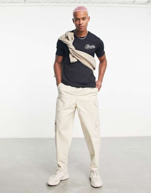 Camiseta negra con logo vintage de Champion ASOS