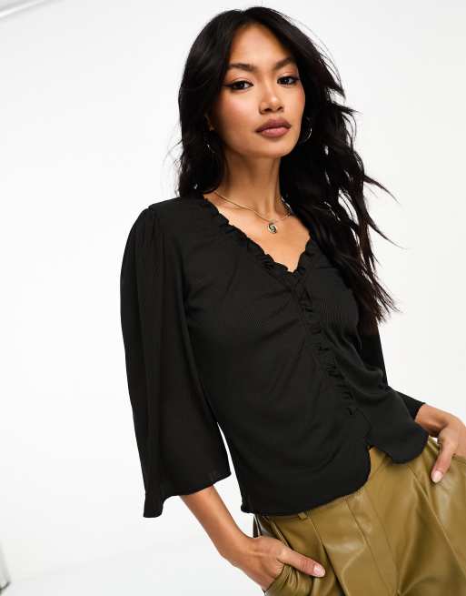 Camiseta negra con mangas acampanadas de canalé de Vila