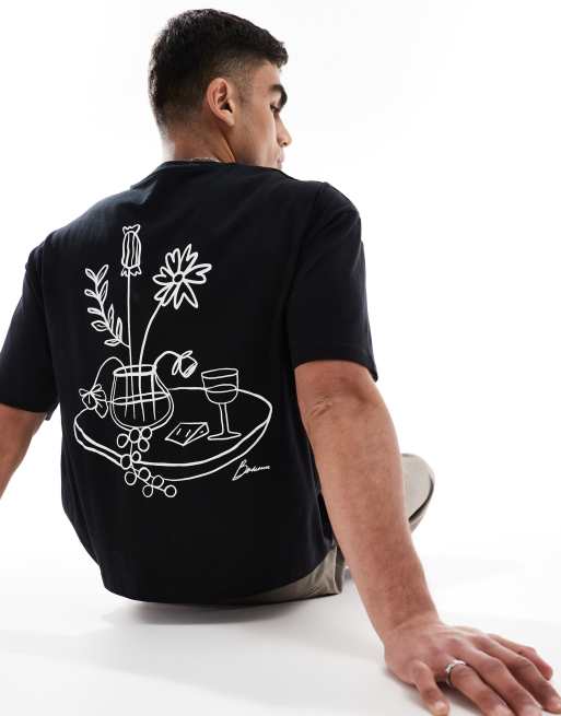 Camiseta negra de corte cuadrado extragrande con estampado gráfico floral de ASOS DESIGN, 4 de 4