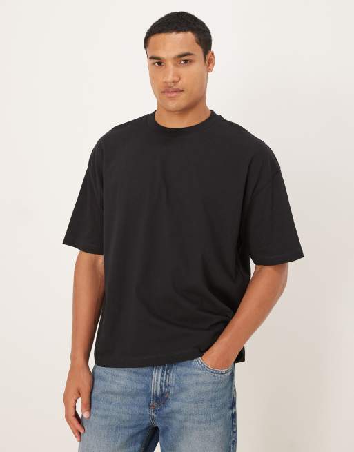 Camiseta negra de corte cuadrado extragrande con estampado gráfico floral de ASOS DESIGN, 3 de 5