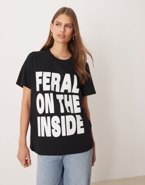 Camiseta negra de corte estándar con gráfico de texto "Feral" de ASOS DESIGN - view 1