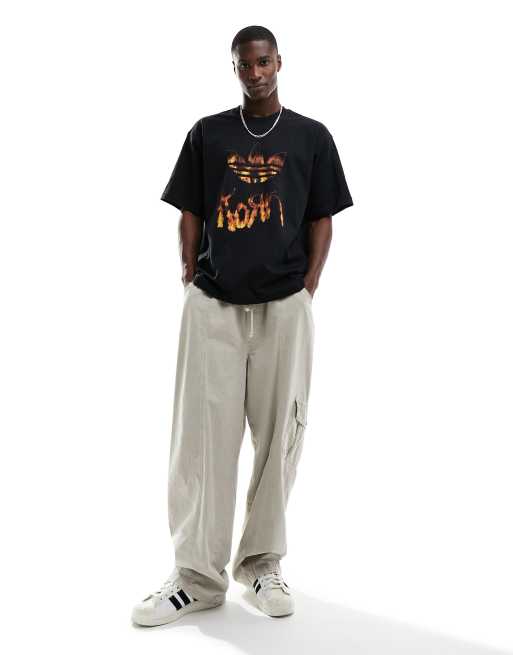 Camiseta negra de manga corta con estampado gráfico de adidas x Korn
