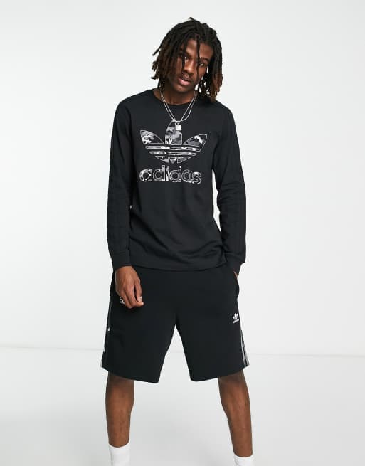 Camiseta negra de manga larga con detalle de camuflaje de adidas Originals