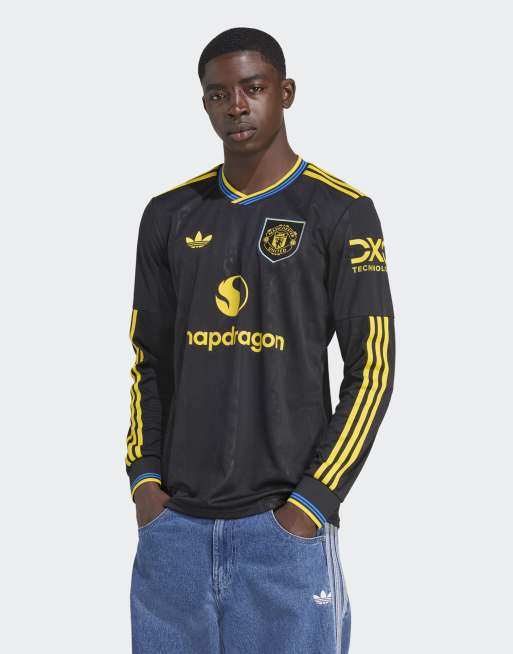 Camiseta negra de manga larga con diseño de la tercera equipación del Manchester United de la temporada 25/26 de adidas Performance