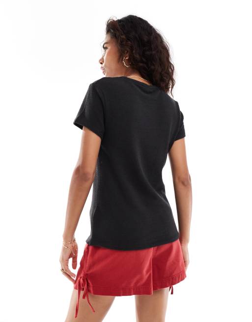 Camiseta negra elástica de corte slim de canalé de Calvin Klein Jeans, 2 de 4