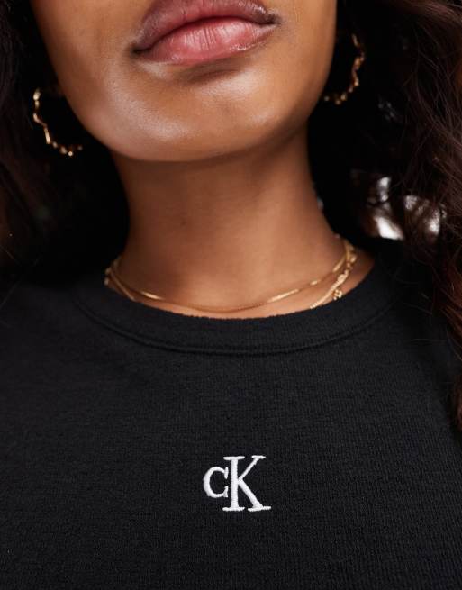 Camiseta negra elástica de corte slim de canalé de Calvin Klein Jeans, 3 de 4