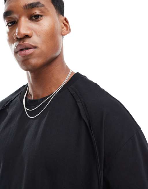 Camiseta negra extragrande con detalle de costuras sin rematar de ASOS DESIGN , 3 de 4