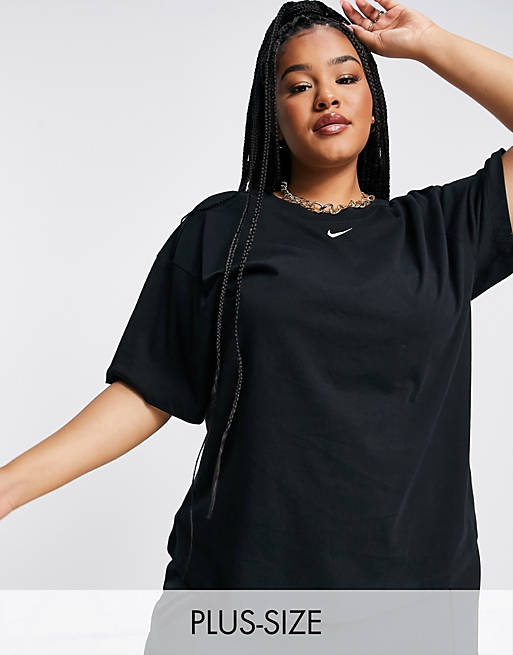 Mujer Tops | Camiseta negra extragrande con detalle del logo en el centro de Nike Plus - UZ17510