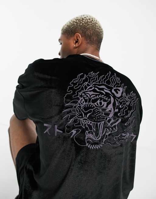 Camiseta negra extragrande con diseño de tigre de velour devoré de ASOS DESIGN