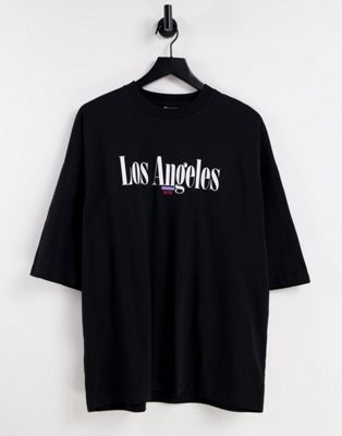 Camiseta ajustada con diseño colour block y estampado Los Angeles de ASOS