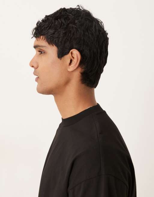 Camiseta negra extragrande con estampado gráfico cósmico de ASOS DESIGN , 4 de 5