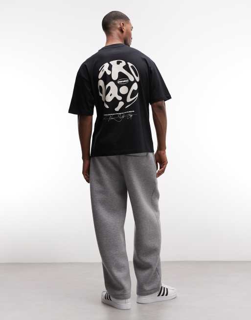 Camiseta negra extragrande con estampado gráfico "Paraiso" de ASOS DESIGN, 2 de 5