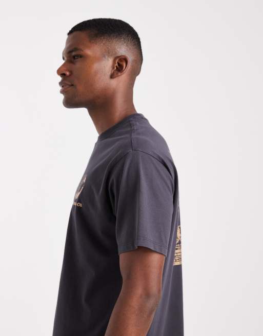 Camiseta negra extragrande con estampado vintage en la espalda de vaquero de Levi's, 4 de 5