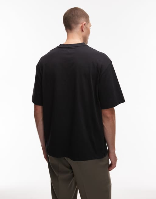 Camiseta negra extragrande con logo pequeño en el pecho Dunstan de Timberland, 3 de 5