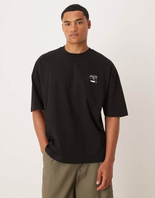 Camiseta negra extragrande con sisas caídas y detalle estampado de ASOS DESIGN, 4 de 4