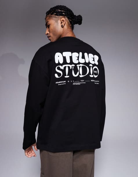 Camiseta negra extragrande de manga larga con estampado gráfico "Atelier Studio" de ASOS DESIGN - view 1