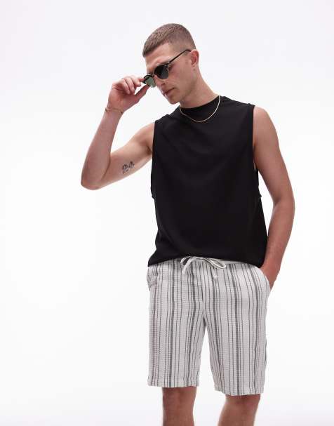 Camiseta negra extragrande sin mangas con diseño entrelazado premium de Topman - view 1