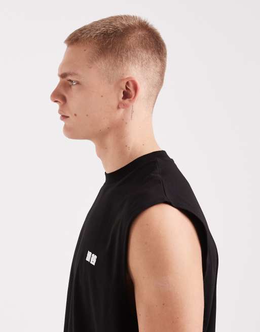 Camiseta negra extragrande sin mangas con estampado de texto "Kyoto" en relieve de ASOS DESIGN, 4 de 5