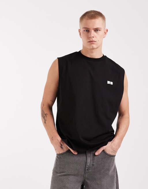 Camiseta negra extragrande sin mangas con estampado de texto "Kyoto" en relieve de ASOS DESIGN, 5 de 5