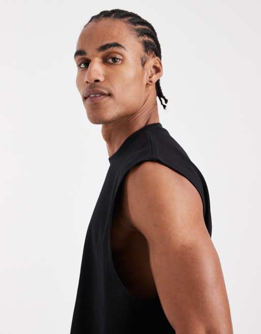 Camiseta negra extragrande sin mangas de tejido grueso de ASOS DESIGN, 4 de 5