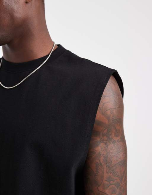 Camiseta negra extragrande sin mangas de tejido grueso de ASOS DESIGN, 5 de 5