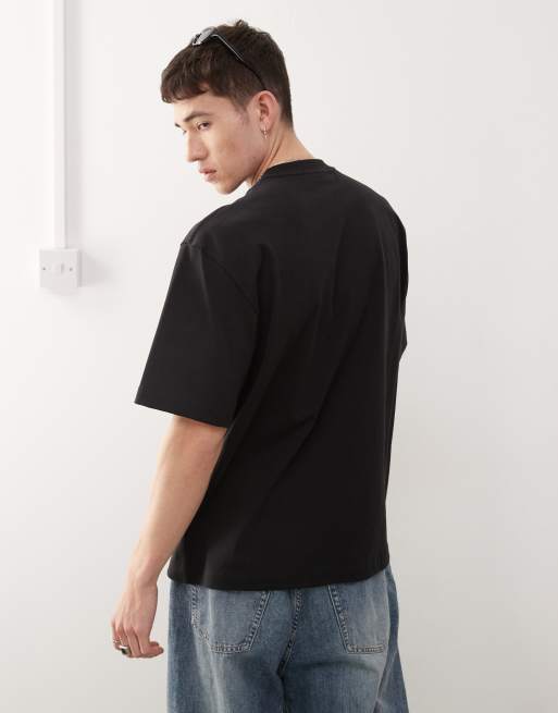 Camiseta negra holgada con estampado gráfico de Weekday, 4 de 4
