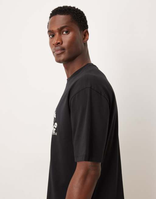 Camiseta negra holgada con estampado pequeño en el pecho de ASOS DESIGN, 4 de 5