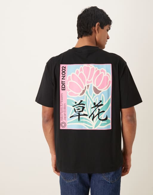Camiseta negra holgada con gráfico color block de flores de ASOS DESIGN