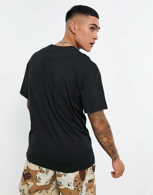 Camiseta negra holgada con logo de bandera en el pecho de Tommy Jeans, 2 de 4
