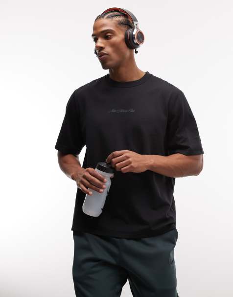 Camiseta negra perforada con logo de texto Athletic Club de Nike Training - view 1