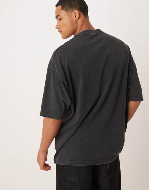 Camiseta negro lavado unisex extragrande con estampados de Guinness de ASOS DESIGN, 2 de 4