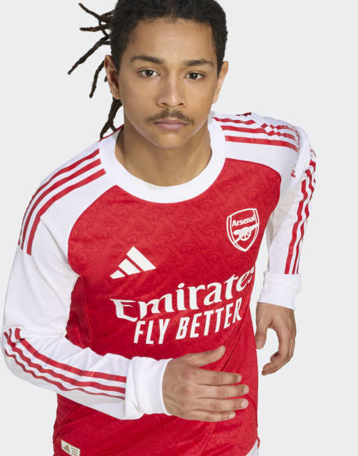 Camiseta rojo escarlata y blanca de manga larga de la primera