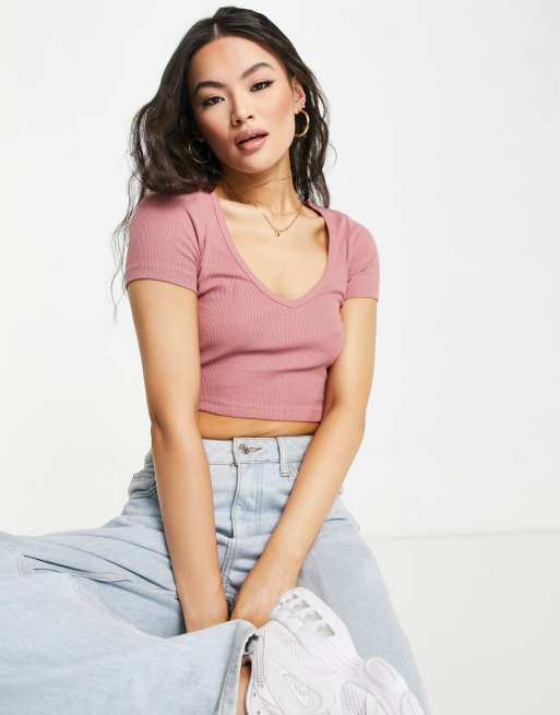 Camiseta rosa ajustada con cuello de pico de canalé de ASOS DESIGN