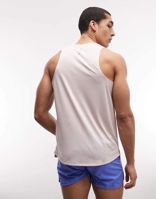 Camiseta rosa claro sin mangas Stride Dri-FIT de Nike Running, 5 de 5
