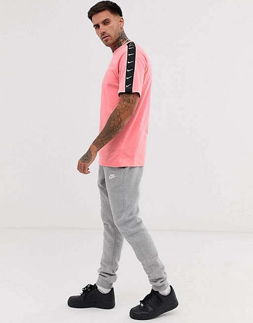 Camiseta rosa con cinta logo de Nike | ASOS