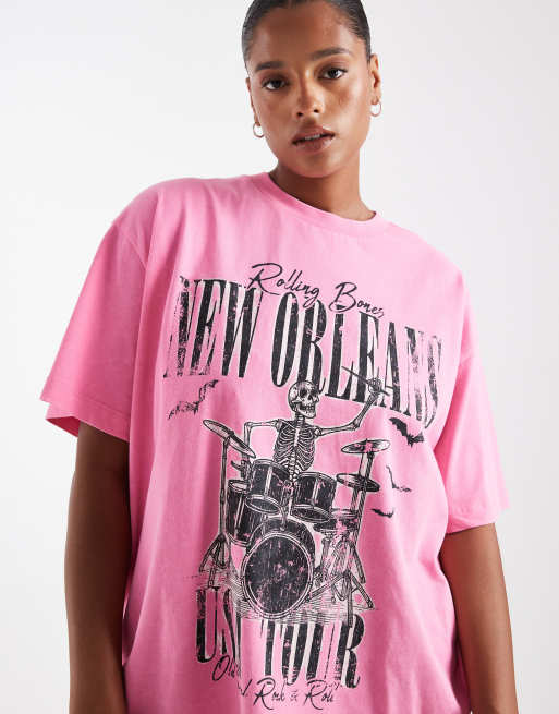 Camiseta rosa lavado extragrande con estampado gráfico de esqueleto de ASOS DESIGN Curve