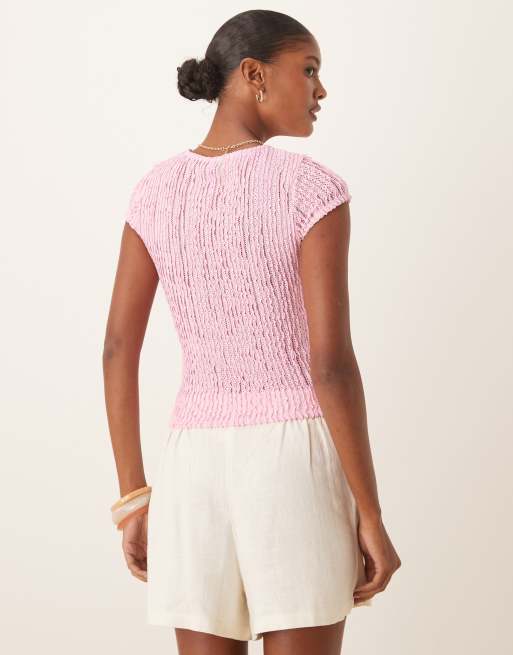 Camiseta rosa pastel texturizada con diseño encogido y volantes de ASOS DESIGN, 4 de 4