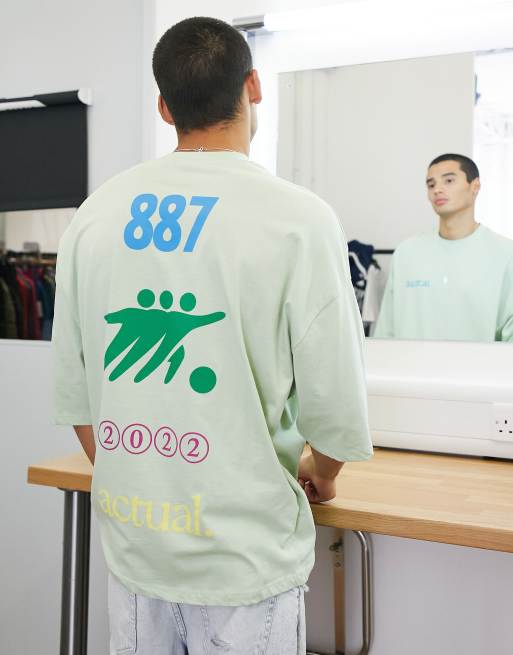Camiseta verde extragrande con estampado gráfico multicolor de ASOS Actual