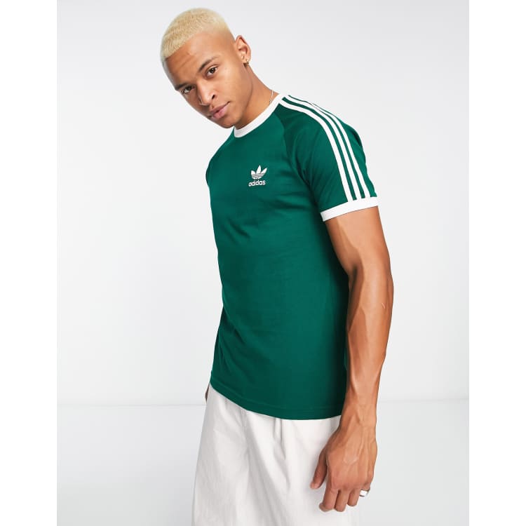 Camiseta verde oscuro con dise o de 3 rayas adicolor de adidas