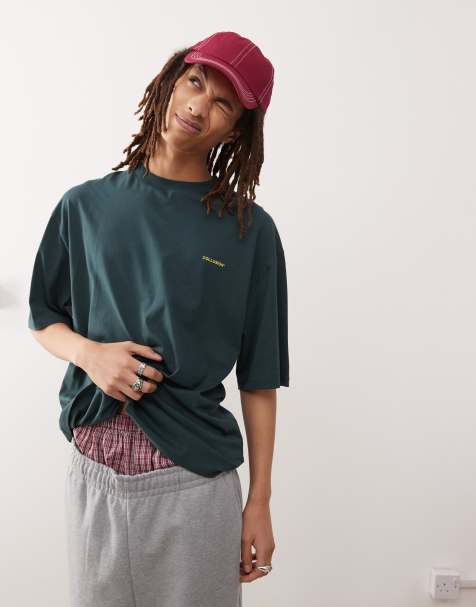 Camiseta verde oscuro con logo de COLLUSION - view 1