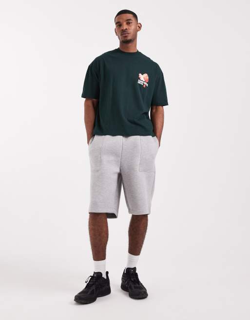 Camiseta verde oscuro de corte cuadrado extragrande con estampado floral gráfico de ASOS DESIGN  , 2 de 5