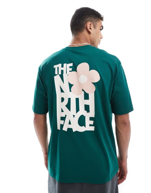 Camiseta verde oscuro extragrande con estampado trasero de flor de