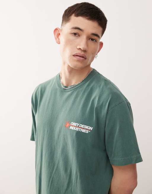 Camiseta verde oscuro pigmentado con estampado gráfico en la espalda y logo Design Industries de Obey