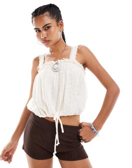 Camisola color marfil de estilo boho con borde de encaje de Free People