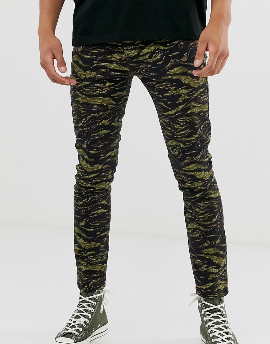 Camouflageprintede skinny bukser fra River Island-Grøn